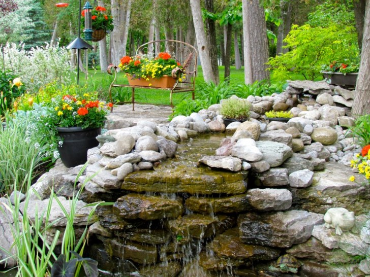 Apartment , 11 Awesome Backyard Waterfalls Ideas : Backyard Waterfall With Flower